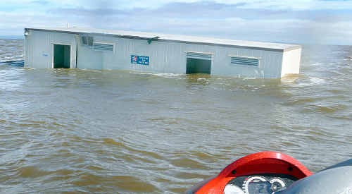 The portable toilets from the Caltex service station in Maryborough are now available for use off Fraser Island. Floodwaters flushed the toilets down the Mary River over the weekend. The portable toilets from the Caltex service station in Maryborough are now available for use off Fraser Island. Floodwaters flushed the toilets down the Mary River over the weekend.